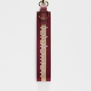NWT Lululemon Never Lost Garnet and Gold Keychain